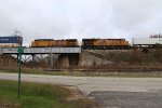 UP 2713 & 6597 pass the intersection of Railroad and West as they roll east above ground level